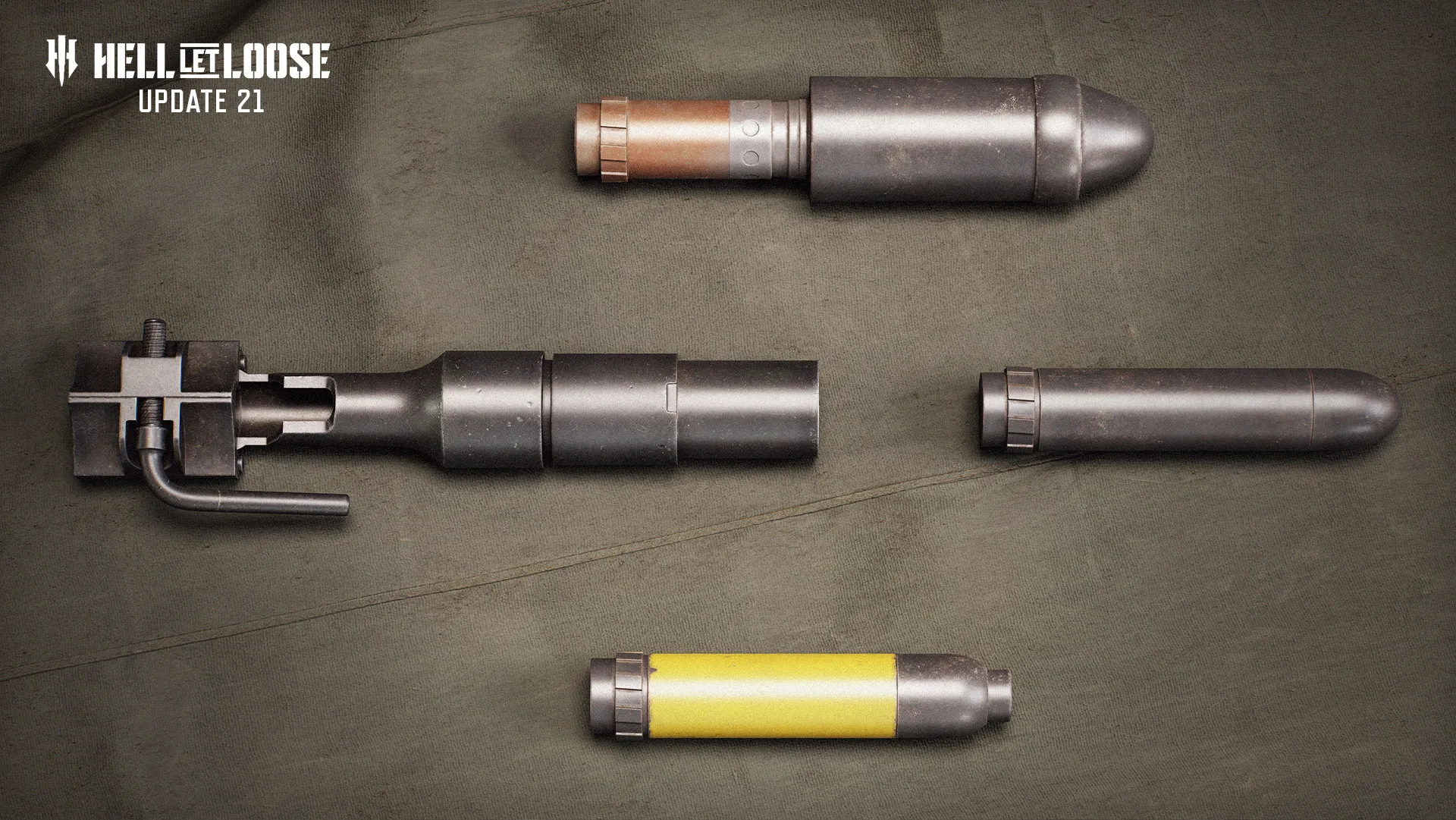 The Update 21 rifle grenade launcher and its grenade types laid out on canvas