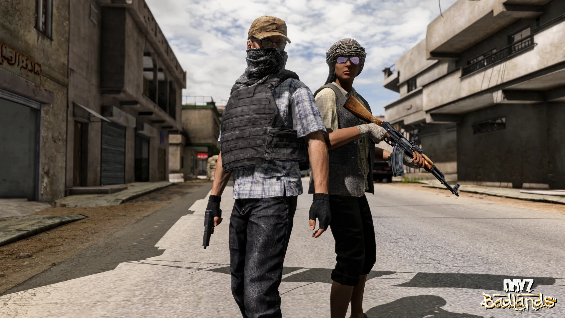 Two survivors in a ruined street, one in a face wrap and body armour, the other in a turban and sunglasses